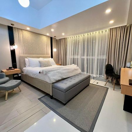 Hotel Vibe Condo At Uptown Parksuites Bgc Taguig Exterior photo