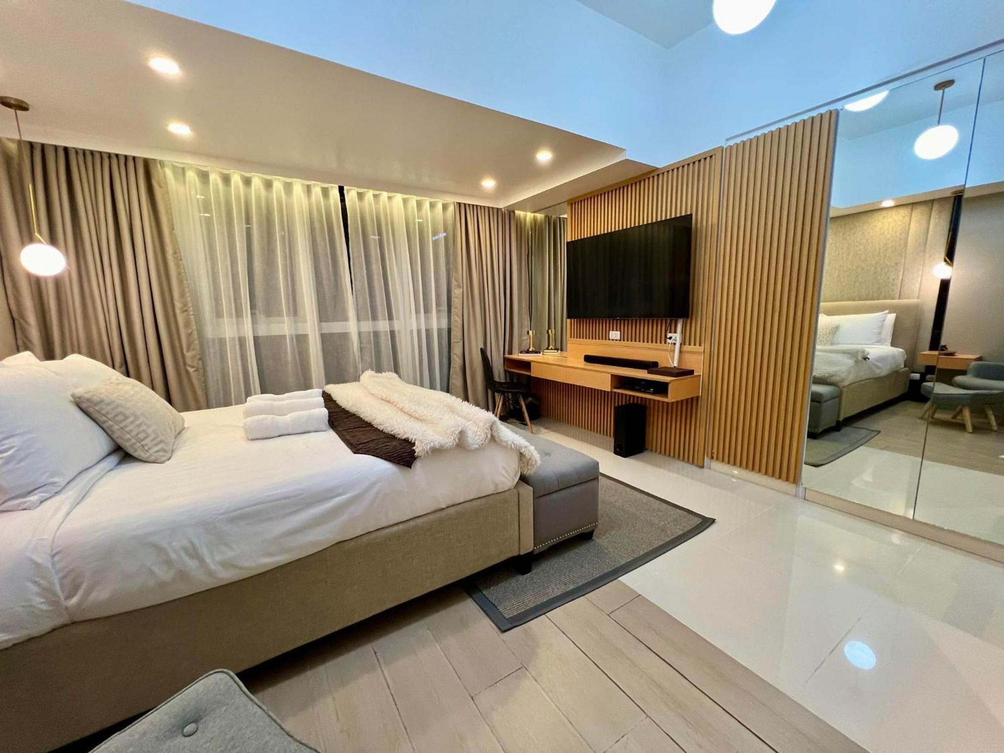 Hotel Vibe Condo At Uptown Parksuites Bgc Taguig Exterior photo